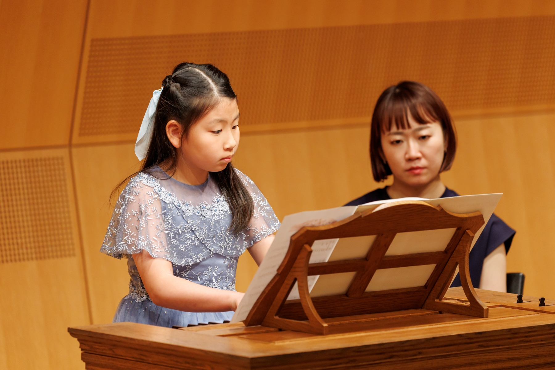 一人の参加者の発表会で演奏している様子。
